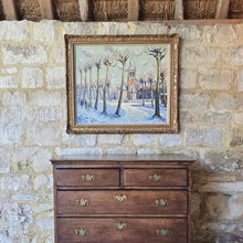 Load image into Gallery viewer, Oil-painting-on-canvas-continental-street-scene-snow-lime-trees-church-Norman-Lloyd-born-Hamilton-New-South-Wales-Australia-Sydney-School-of-Art-Europe-London-Royal Institute-of-Oil-Painters-impressionist-street-scene-Bruges-demonstrates-exceptionally-good-use-of-light-and-colour-signed-gilt-frame-antique-fine-wall-art-antiques-for-sale-damon-blandford-antiques-stow-on-the-wold-cotswolds
