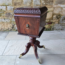 Load image into Gallery viewer, Good-quality-early-19th-century-Irish-cellarette-sarcophagus-form-pedestal-base-carved-acanthus-leaves-gadrooned-rope-twist-mouldings-brass-lion-mask-ring-carry-handles-oval-escutcheon-plate-original-lock-key-quadra-form-base-reeded-sabre-legs-hipped-carved-foliate-decoration-terminating-brass-box-toe-castors-furniture-excellent-colour-condition-patena-for-sale-damon-blandford-antiques-stow-on-the-wold-stroud-cotswolds-antique-drinks-bottles-storage
