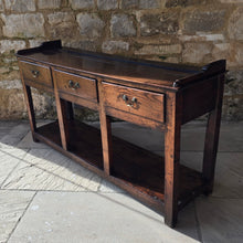 Load image into Gallery viewer, excellent-colour-georgian-oak-dresser-with-open-rack-three-shelves-moulded-cornice-hand-forged-iron-hooks-drawers-lined-in-pine-drawer-fronts-moulded-edges-brass-swan-neck-drop-handles-raised-on-primitive-supports-pot-board-excellent-condition-fresh-to-market-circa-1780-1800-for-sale-damon-blandford-antiques-stow-on-the-wold-kitchen-dinning-room-furniture
