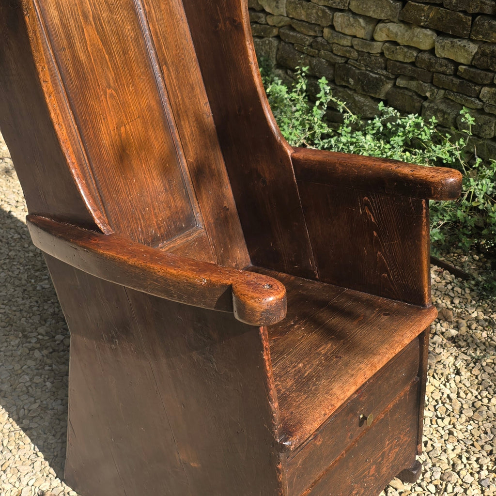 good-example-vernacular-lambing-chair-painted-pine-boarded-paneled-back-shaped-crest-rail-side-wings-generous-shaped-arm-supports-boarded-seat-drawer-under-seat-storage-shepherds-lambing-raked-back-rests-comfortable-side-wings-lancashire-circa-1800-late-C18th-earlyC19th-century-for-sale-damon-blandford-antiques-stow-on-the-wold-cotswolds