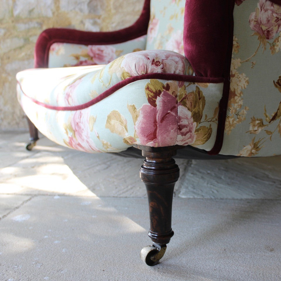 two-small-seater-upholstered-sofa-settee-turned-rosewood-legs-square-swept-concave-brass-cators-stamped-holland-&-sons-damon-blandford-antiques-chair-seating-for-sale-gloucestershire-chintz-floral-velvet-burgundy-roses-quality-fine-london-maker