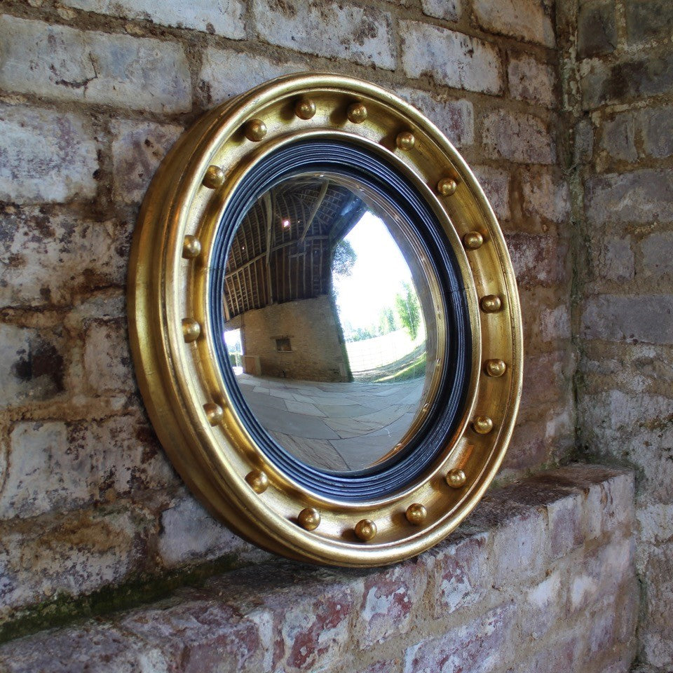 round-circular-regency-19th-century-convex-wall-mirror-giltwood-frame-applied-ball-decoration-concentric-ebonised-reeded-slip-mirrors-frame-giding-gilt-original-damon-blandford-antiques-gloucestershire-cotswolds-for-sale-decorative-interiors-country-house