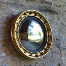 Load image into Gallery viewer, round-circular-regency-19th-century-convex-wall-mirror-giltwood-frame-applied-ball-decoration-concentric-ebonised-reeded-slip-mirrors-frame-giding-gilt-original-damon-blandford-antiques-gloucestershire-cotswolds-for-sale-decorative-interiors-country-house-wall-art-decoration-interior-style
