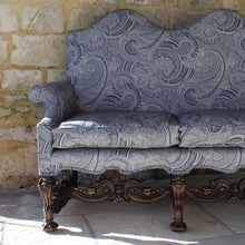 Load image into Gallery viewer, jacobean-revival-settee-exceptionally-good-quality-newly-upholstered-stunning-ludhiana-wool-fabric-intricate-decoration-inspiration-traditional-indian-patterns-features-swirling-floral-design-blue-cream-colourway-seat-completely-re-built-original-horse-hair-seat-pad-feather-cushions-settee-incredibly-stylish-comfortable-carved-parcel-gilt-show-wood-legs-stretchers-foliate-design-statement-piece-english-circa-1900-damon-blandford-antiques-stroud-gloucestershire-interior-design-seating-for-sale
