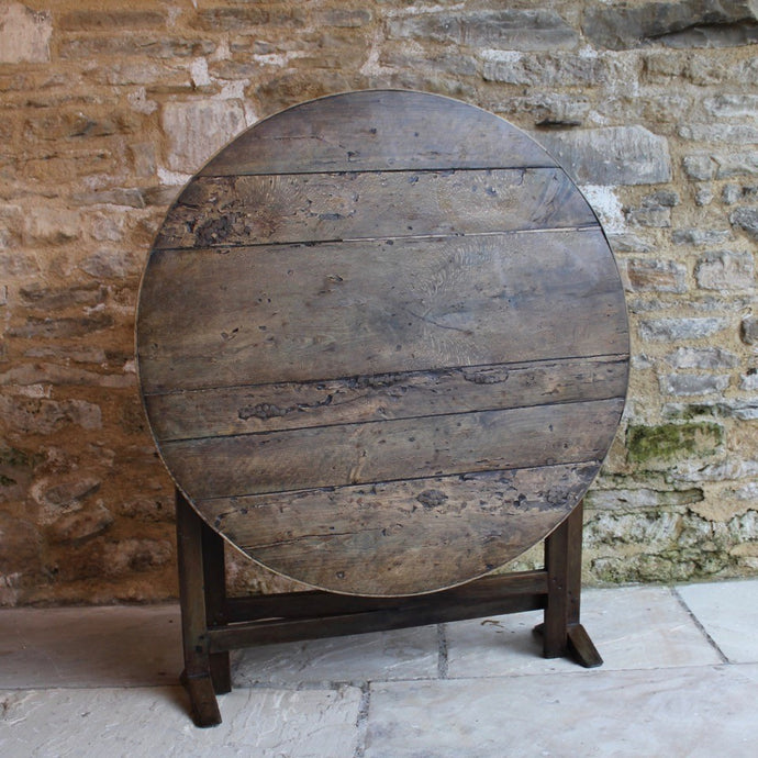 incredibly-attractive-wine-tasting-table-vendange-table-vineyards-france-french-19th-century-easily-stored-away-tilting-mechanism-top-orientated-upright-position-constructed-from-mixed-hardwoods-wonderful-time-worn-patina-historic-repairs-remnants-old-paint-occasional-table-good-condition-useful-home-damon-blandford-antiques-interior-design-chic-vintage-for-sale-cotswolds-gloucestershire 