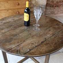 Load image into Gallery viewer, incredibly-attractive-wine-tasting-table-vendange-table-vineyards-france-french-19th-century-easily-stored-away-tilting-mechanism-top-orientated-upright-position-constructed-from-mixed-hardwoods-wonderful-time-worn-patina-historic-repairs-remnants-old-paint-occasional-table-good-condition-useful-home-damon-blandford-antiques-interior-design-chic-vintage-for-sale-cotswolds-gloucestershire-country-house-antiques-wine-glasses
