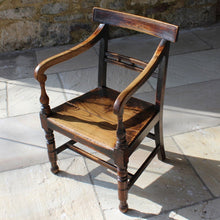 Load image into Gallery viewer, elm-ball-back-open-armchair-fabulous-colour-black-warm-golden-tones-timber-naturally-burnished-two-hundred-years-grecian-style-swept-arms-supported-ring-turned-front-legs-baluster-shaped-arm-supports-back-rest-constructed-square-shaped-posts-supporting-horizontal-cross-rails-ball-decoration below-wider-top-rail-raised-turned-front-legs-square-swept-legs-united-stretchers-damon-blandford-antiques-for-sale-seating-stroud-gloucestershire-two-plank-seat
