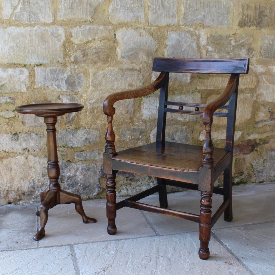 elm-ball-back-open-armchair-fabulous-colour-black-warm-golden-tones-timber-naturally-burnished-two-hundred-years-grecian-style-swept-arms-supported-ring-turned-front-legs-baluster-shaped-arm-supports-back-rest-constructed-square-shaped-posts-supporting-horizontal-cross-rails-ball-decoration below-wider-top-rail-raised-turned-front-legs-square-swept-legs-united-stretchers--damon-blandford-antiques-for-sale-seating-stroud-gloucestershire-two-plank-seat
