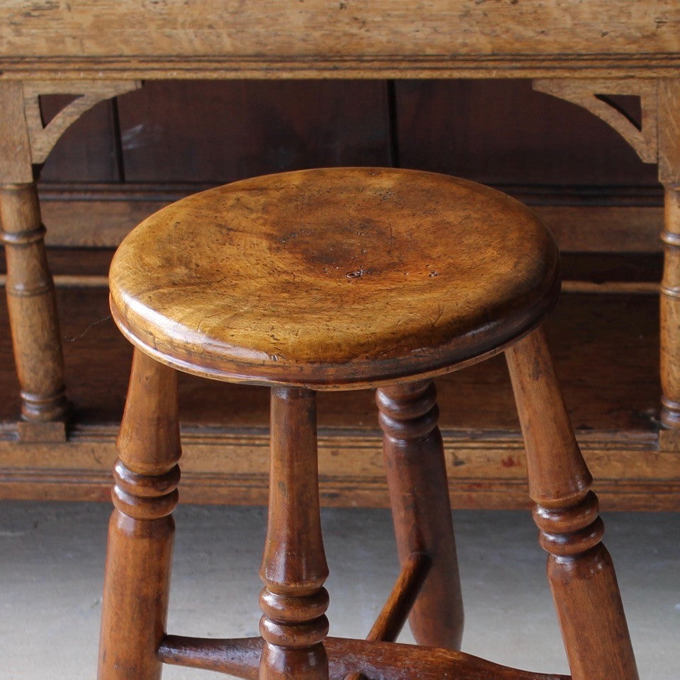 stunning-sycamore-mill-workers-stool-wonderful-time-work-patina-circular-dished-seat-tall-taller-than-average-stool-seat-raised-four-turned-legs-united-X-shape-stretcher-excellent-condition-most-probably-cotton-makers-stool-boston-lincolnshire-damon-blandford-antiques-gloucestershire-for-sale-seating-country-house