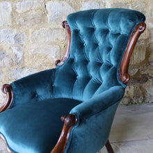Load image into Gallery viewer, incredibly-attractive-victorian-button-back-upholstered-armchair-show-wood-frame-cabriole-legs-brass-castors-porcelain-wheels-excellent-condition-professionally-re-upholstered-teal-colour-velvet-generous-proportions-shaped-back-rest-comfortably-stylish-useful-damon-blandford-antiques-C19th-century-seating-for-sale-stroud-gloucestershire-cotswolds-interior-home-decor-design
