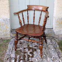 Load image into Gallery viewer, 19th-century-beech-and-elm-captains-smokers-bow-armchair-good-colour-chair-constructed-beech-saddled-seat-carved-slab-elm-ring-turned-legs-united-double-H-stretcher-good-solid-comfortable-chair-excellent-condition-damon-blandford-antiques-stroud-gloucestershire-cotswolds-seating-for-sale
