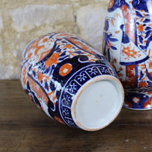 Load image into Gallery viewer, very-nice-pair-Imari-vases-fourth-quarter-19th-Century-beautifully-decorated-all-over-foliate-design-red-blue-glazes-white-ground-retaining-excellent-colour-excellent-condition-damon-blandford-antiques-for-sale-stroud-gloucestershire-cotswolds-country-house-interior-design-decoration
