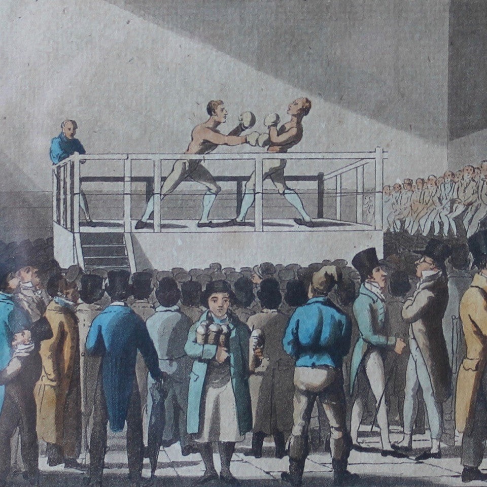 Fabulous-composition-depicting-boxing-match-at-fives-court-sporting-venue-demolished-redevelopment-royal-mews-now-trafalgar-square-fives-ball-game-played-gloved-bare-hand-ball-against-walls-court-framed-ebonised-moulded-wooden-lithograph-a-set-to-at-the-fives-court-for-the-benefit-of-one-of-the-fancy-engraving-by-sutherland-from-drawings-by-s-alken-london-published-oct-13th-1823-by-thos-kelly-17-patternoster-row-wall-art-for-sale-damon-blandford-antiques-stroud