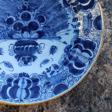 Load image into Gallery viewer, 18th-Century-delft-charger-wall-plate-de-klaauw-factory-blue-and-white-charger-peacock-pattern-blue-underglaze-factory-mark-verso-good-overall-condition-no-cracks-or-repairs-losses-to-rim-for-sale-damon-blandford-decorative-antiques-stroud-cotswolds
