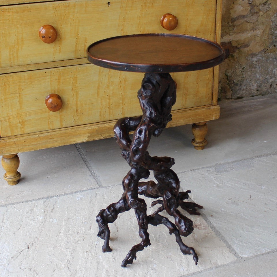 absolutely-wonderful-grapevine-root-table-late-18th-early-19th-century-gnarly-grapevine-roots-branch-out-feet-like-structures-stable-pedestal-base-supporting-circular-table-top-single-plank-hard-wood-possibly-ash-applied-lipped-edge-rose-head-nails-charming-character-excellent-condition-genuinely-unique-talking-point-patina-for-sale-damon-blandford-antiques-stroud-gloucestershire