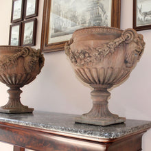 Load image into Gallery viewer, good-quality-pair-of-late-20th-century-terracotta-garden-urns-classical-reeded-cup-goblet-shape-bowl-pedestal-bases-beautifully-detailed-satyr-masks-united-fruit-foliage-swags-excellent-nicely-weathered-highly-decorative-urns-magnificent-garden-indoors-for-sale-damon-blandford-antiques-stow-on-the-wold-stroud-gloucestershire-cotswolds
