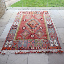 Load image into Gallery viewer, Incredibly-attractive-turkish-flat-weave-kilim-sivrihisar-central-anatolia-naturally-dyed-hand-spun-sheep-wool-predominantly-light-shades-red-orange-green-pink-blue-brown-cream-central-field-features-large-diamond-shaped-scorpion-motif-star-motifs-wolf&#39;s-mouth-motifs-symbols-represent-protection-happiness-fertility-protective-themes-motifs-repeated-boarders-coloured-yarns-fringe-tassels-hand-embroidery-traditional-technic-cisim-circa-1960s-70s-for-sale-damon-blandford-antiques-vintage
