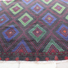 Load image into Gallery viewer, cisim-traditional-method-embroidery-work-flat-weave-woven-kilim-spun-naturally-dyed-goats-yarn-course-hard-wearing-floor-rug-pattern-geometric-design-repeating-alternating-green-blue-diamond-shape-motifs-burgundy-ground-black-orange-striking-rug-dining-room-kitchen-high-traffic-turkey-konya-circa-1950s-for-sale-damon-blandford-antiques-vintage-carpet-interior-design

